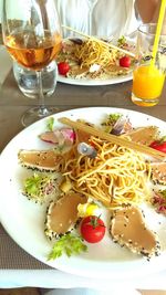 Close-up of served food on table