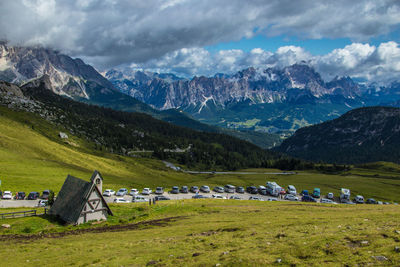 Scenic view of landscape and mountains against sky