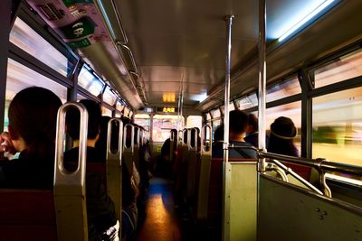 People sitting in subway train