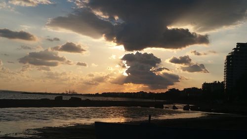 Scenic view of calm sea at sunset