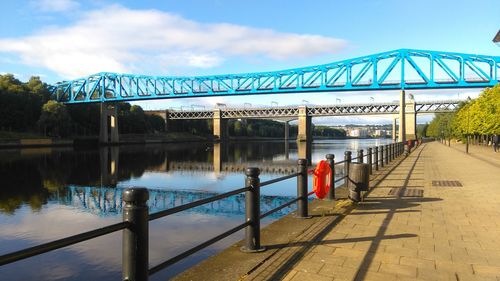 Bridge over river against sky