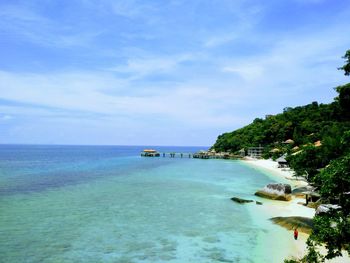 Scenic view of sea against blue sky