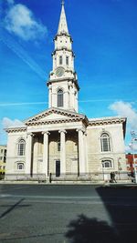 Low angle view of church against blue sky