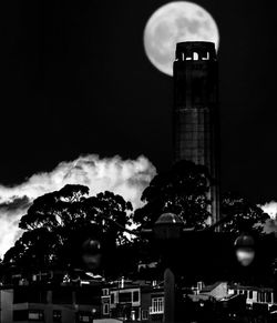 Cityscape against sky at night