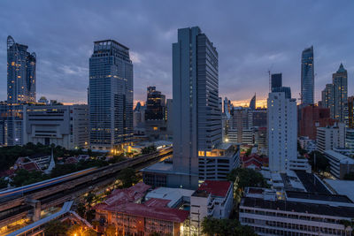 Bangkok, thailand - 12 august 2022 - view of bangkok cityscape high-rises and bts skytrains