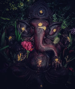 Close-up of buddha statue in temple