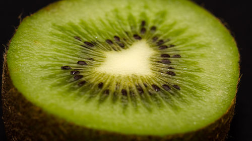 Close-up of fruit over white background