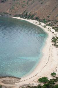 High angle view of cristo rei backside beach or dolok oan beach in dili, timor leste. 