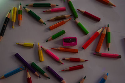 High angle view of colored pencils on table