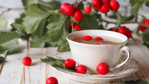 Close-up of red fruit on table