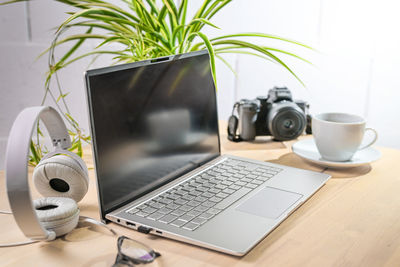 Close-up of laptop on table