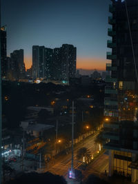 High angle view of illuminated buildings at night
