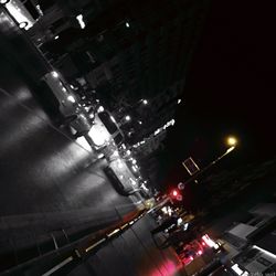 High angle view of illuminated buildings in city