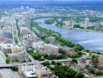 High angle view of river amidst buildings in city