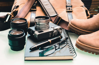 High angle view of personal accessories on table