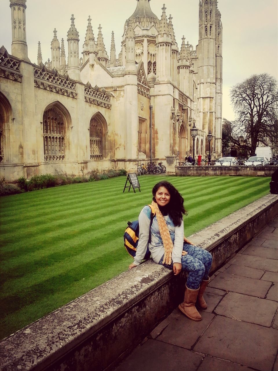 architecture, building exterior, built structure, grass, lifestyles, leisure activity, young adult, casual clothing, person, full length, lawn, standing, looking at camera, portrait, young women, day, outdoors, green color