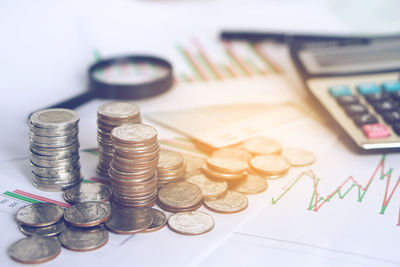 Close-up of coins on table