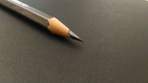 Close-up of pencil on paper