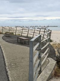 Built structure on beach against sky