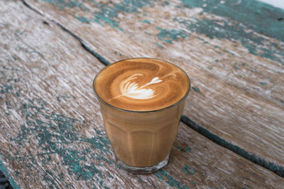 Close-up of cappuccino on table