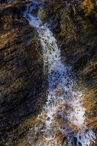 Water splashing on rocks