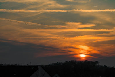 Scenic view of dramatic sky during sunset