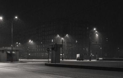 Illuminated street lights at night