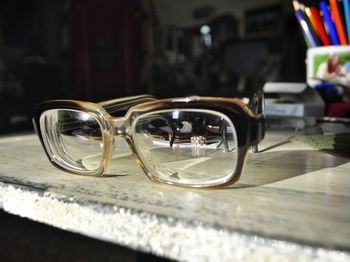 Close-up of sunglasses on table