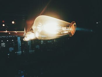 Close-up of illuminated light bulb