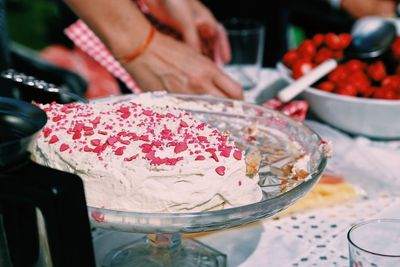 Birthday cake on stand at table