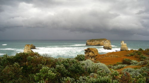 Scenic view of sea against cloudy sky