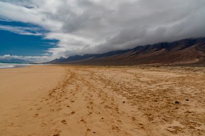 Scenic view of desert against sky