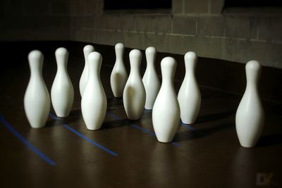 High angle view of bowling pins on floor