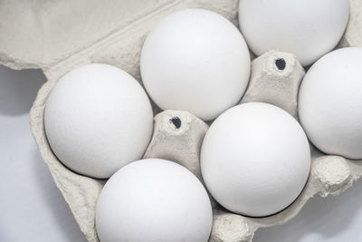 High angle view of eggs in container