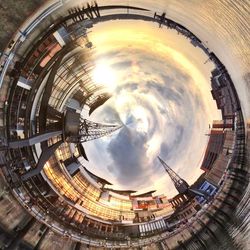 Low angle view of building against cloudy sky