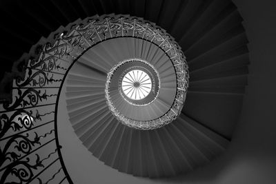 Low angle view of spiral staircase in building