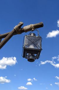 Low angle view of street light against sky