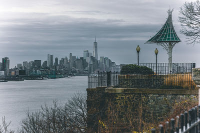 Modern buildings in city against cloudy sky. view of new york city.