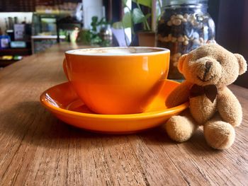 Close-up of coffee cup on table