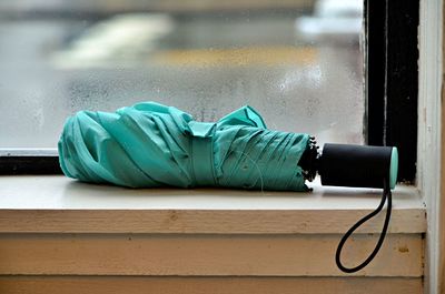 Green umbrella on a rainy day in richmond, va