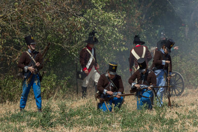 Panoramic shot of people in field