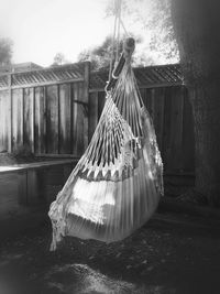 Close-up of clothes hanging in backyard
