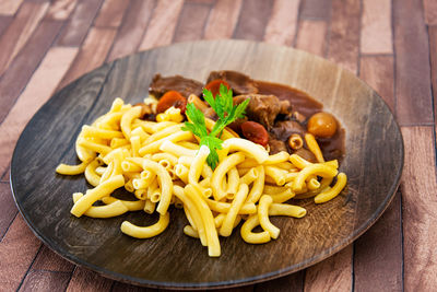 Close-up of pasta in plate on table