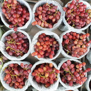 High angle view of seedless red grapes