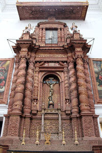 Low angle view of temple against building