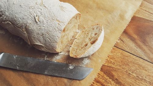 High angle view of bread on cutting board