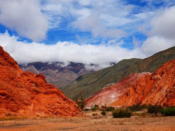 Scenic view of landscape and mountains against sky