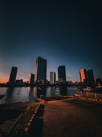Buildings in city at night