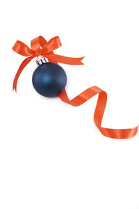 Close-up of christmas decorations over white background