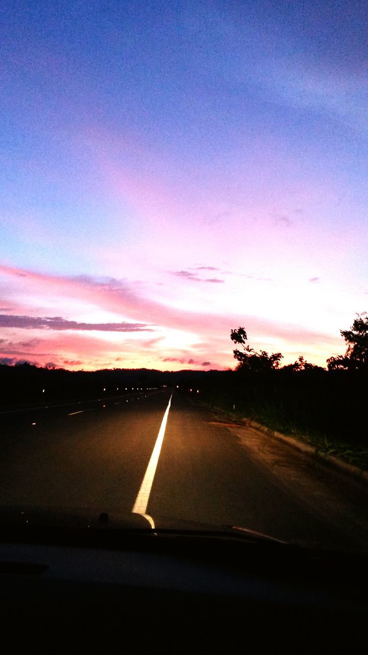 transportation, sunset, road, sky, silhouette, land vehicle, road marking, car, mode of transport, cloud - sky, landscape, country road, tree, dusk, orange color, scenics, the way forward, street, cloud, beauty in nature